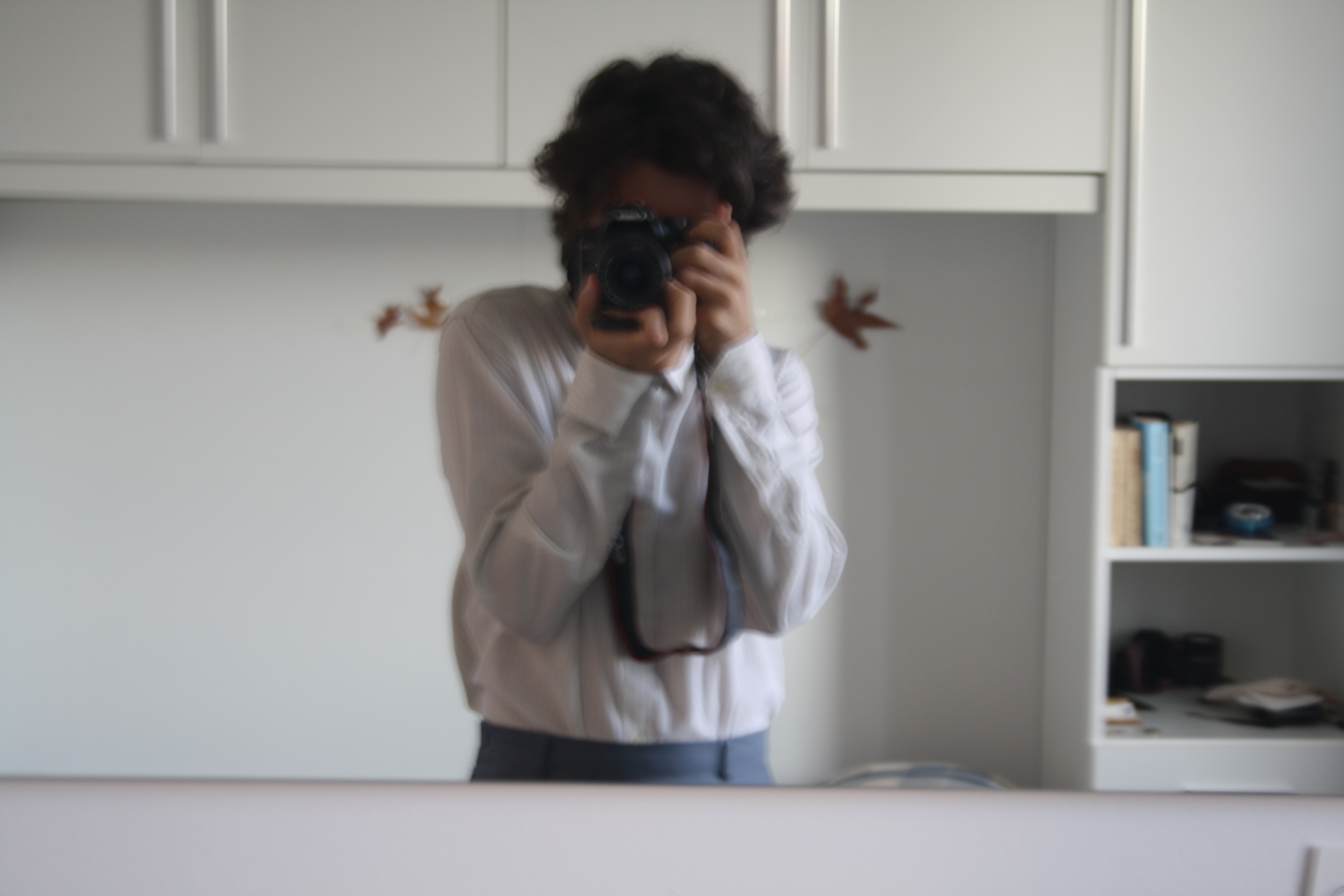 A photo of a photo of a reflection of you